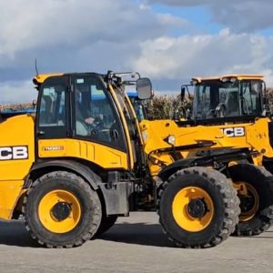 Right side view of the JCB TM 320S telehandler, highlighting its powerful build and durable design for agricultural tasks.