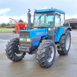 Left-side front diagonal view of the Landini Blizzard 85 tractor, displaying its robust design and operational features.