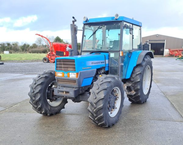 Left-side front diagonal view of the Landini Blizzard 85 tractor, displaying its robust design and operational features.