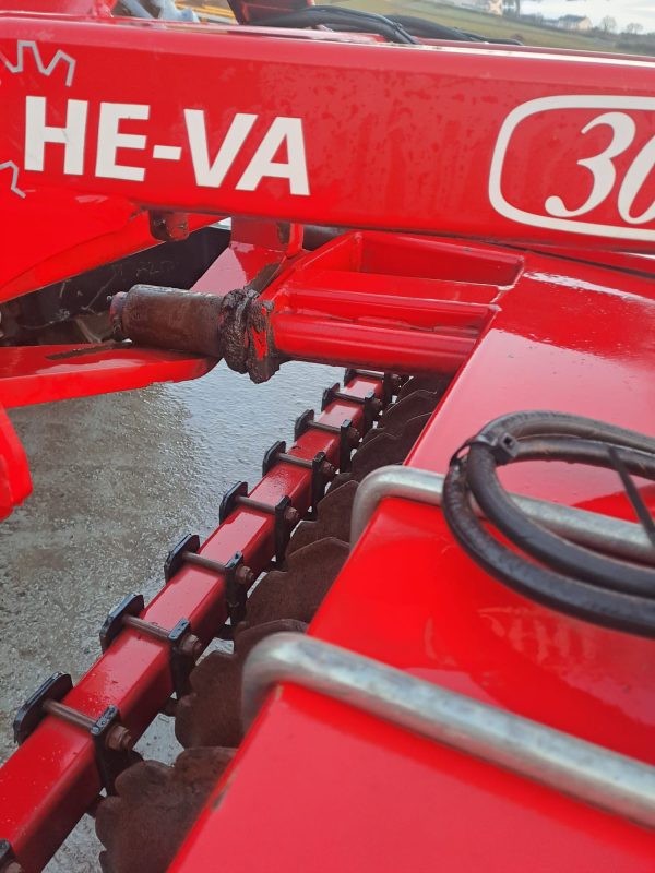 Close side view of the Front Press HI VA, showcasing its detailed design and functionality for efficient agricultural use.