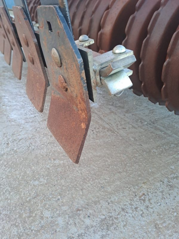 Close-up of the bottom part of the bumper on the Front Press HI VA, highlighting its strong build for agricultural durability.