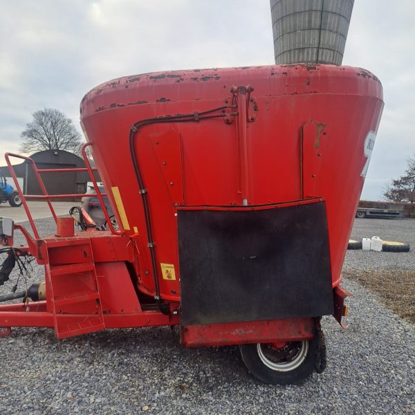 Left-side view of the Red Rock VM 14 Tub Diet Feeder, showcasing its overall design and digital display for efficient feed management in livestock operations.