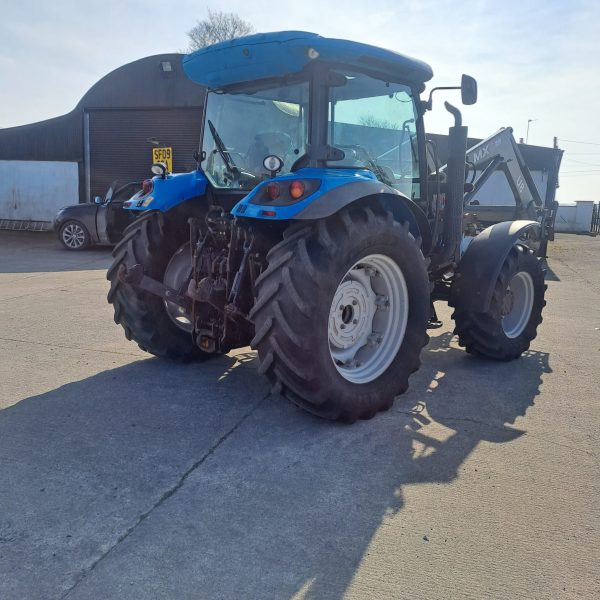 Backside diagonal view of a blue U8 MX tractor, showcasing its rear design and agricultural machinery features.